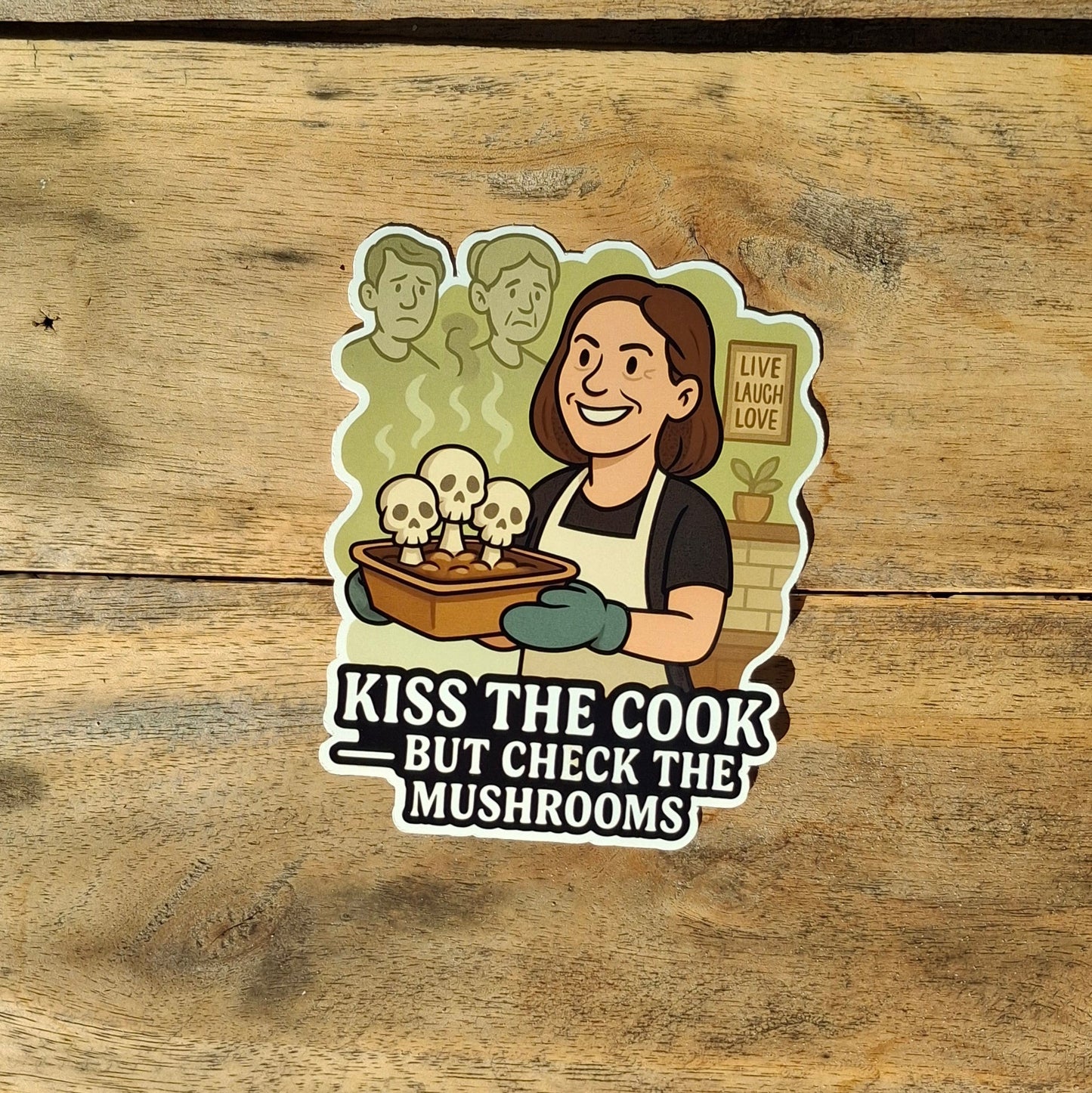 Sticker with a cartoon character on a wooden surface